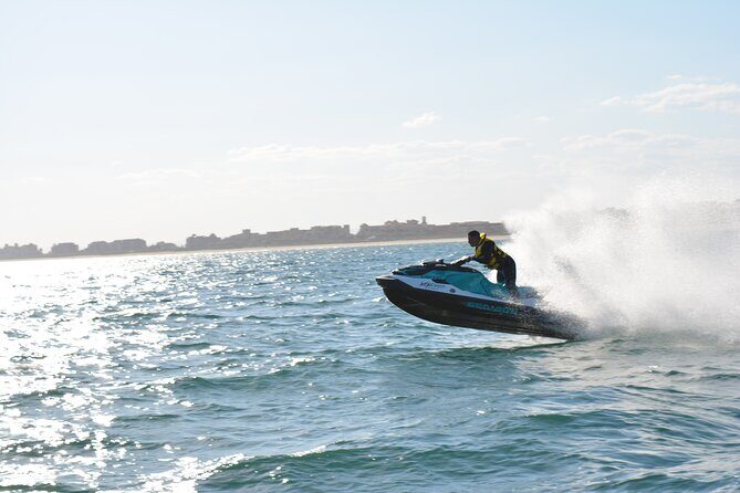 1 Hour Jet Ski Experience in Isla Canela - Passing under the Spain–Portugal bridge: the border moment