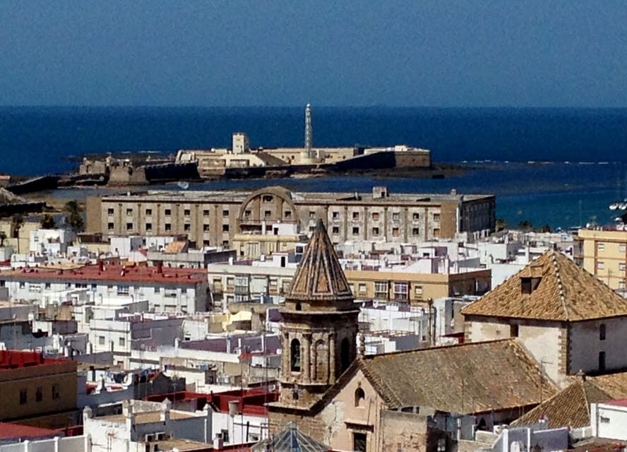 Cadiz Full-Day Guided Excursion from Seville - Roman Theater, Gran Teatro Falla, and Plaza de España: city identity in architecture