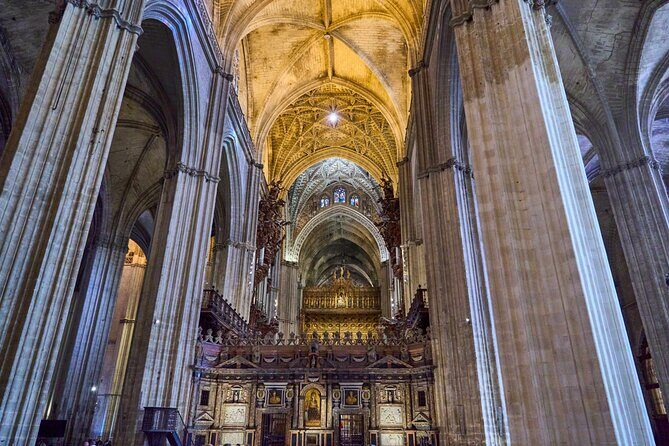 Cathedral and Giralda Tour - Entering Seville Cathedral: Gothic scale you feel right away
