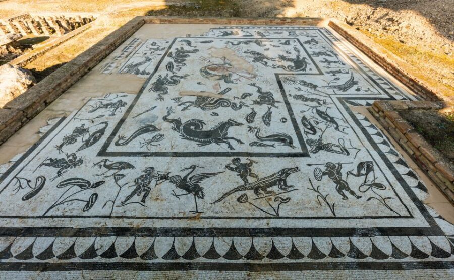 From Seville: Italica Roman City & Medieval Monastery Tour - Italica’s amphitheater: the Dragonpit moment and the scale lesson
