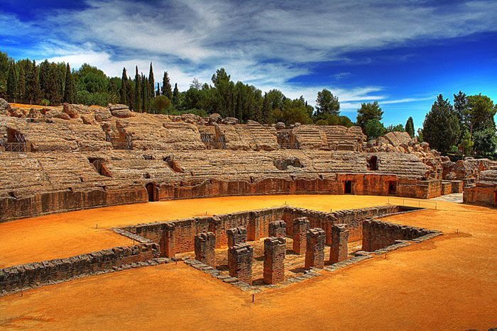 From Seville: Italica Roman City Tour - Amphitheater time: why Italica is famous for its size