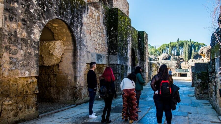From Seville: Italica Roman City Tour - The Roman theater in Santiponce: partially reconstructed, still understandable