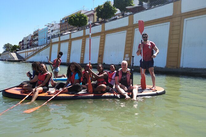 Gigant paddle surf in Seville - Games, Dips, and Learning to Paddle Like a Team