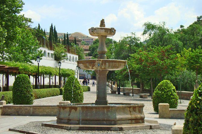 Granada Day Trip from Seville with Skip-the-line Alhambra Access - Albayzín walking tour: cobblestones, flowers, and neighborhood perspective