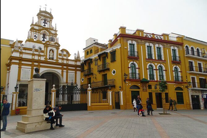 Guided walking tour to Setas, La Macarena and Dueña's Palace in Seville - San Juan de la Palma and the traditional street market energy