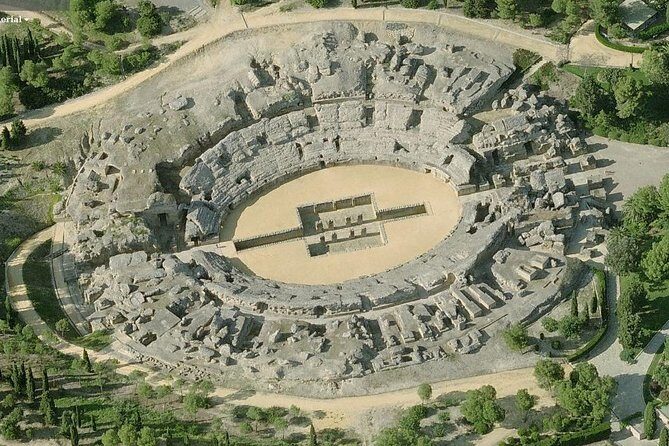 Historical Italica: Half-Day Guided Tour from Seville - Entering the Roman Amphitheater: More Than Big Stones