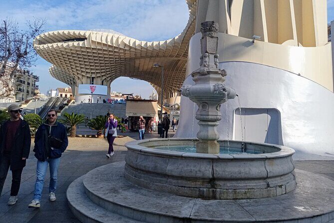 Must See Running Tour Of Sevilla - Cathedral complex from the outside: Orange Trees, Plaza del Cabildo, and the Archivo