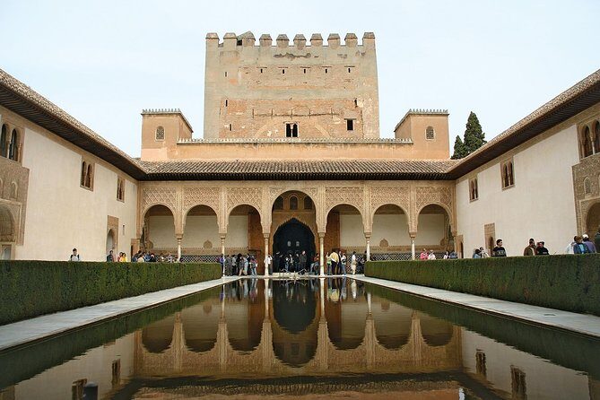 Private Granada Alhambra Tour from Seville - Seville to Granada in an A/C van: how the day is paced