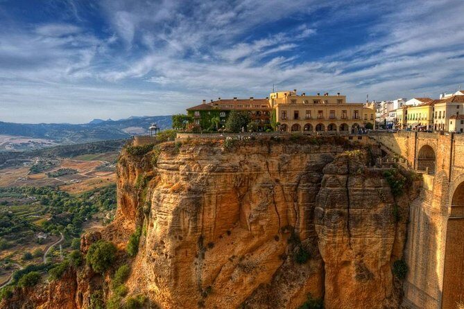 Private Guided Day Trip to the White Villages and Ronda from Seville - Ronda: Puente Nuevo, historic center time, and guided views