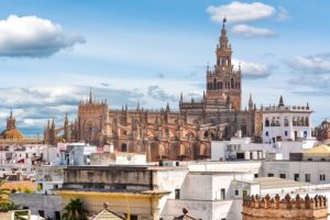 Private Monumental Walking Tour in Seville - A regionalist street stop for early-20th-century Sevilla