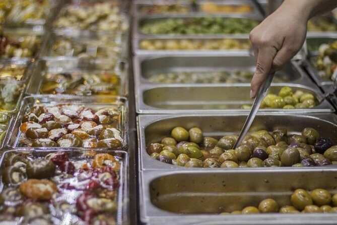 Private Seville Historical Food Tour of 15+ Tasty Hidden Gems - Stop 3: La Giralda—minaret origins to cathedral bell tower