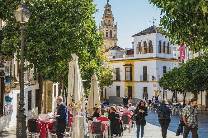 Private Transfer Seville to Granada with a Tour of Cordoba/Mosque - Walking the Old Jewish Quarter: Patios, Tiles, and the Lane of Flowers