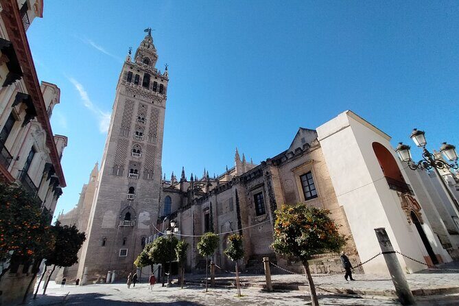 Private Walking Tour Alcazar and Cathedral in Sevilla - Real Alcázar of Seville: Islamic Roots and Royal Refitting