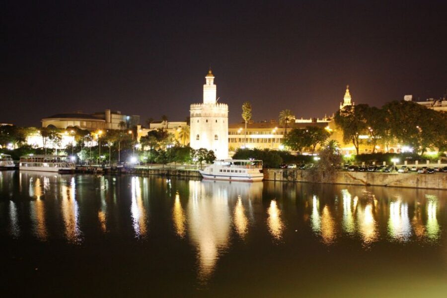 Seville: 2.5-Hour Evening Electric Bike Tour - Plaza de España and the Bridge of Triana after dark