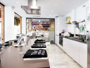 Seville: 3.5-Hour Spanish Cooking Class & Triana Market Tour - Meeting the cooking school inside the market