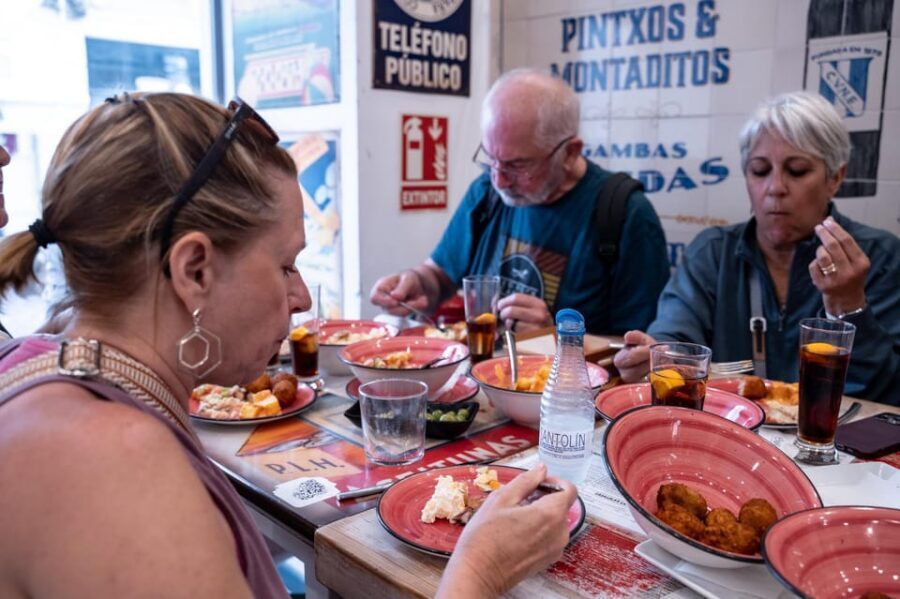 Seville Adventure: Historic Walking Tour & Traditional Tapas - Plaza del Triunfo and the General Archive of the Indies: the “power centers” walk