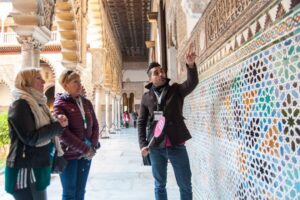 Seville: Alcázar and Cathedral Entry Ticket and Guided Tour - Alcázar highlights: Muslim palaces, royal rooms, and centenary gardens