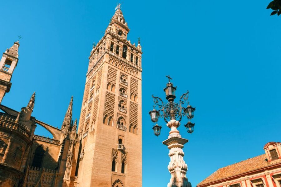 Seville: Alcázar, Cathedral & Giralda Fast Track Guided Tour - Getting Started at Plaza del Triunfo with the Orange Umbrella