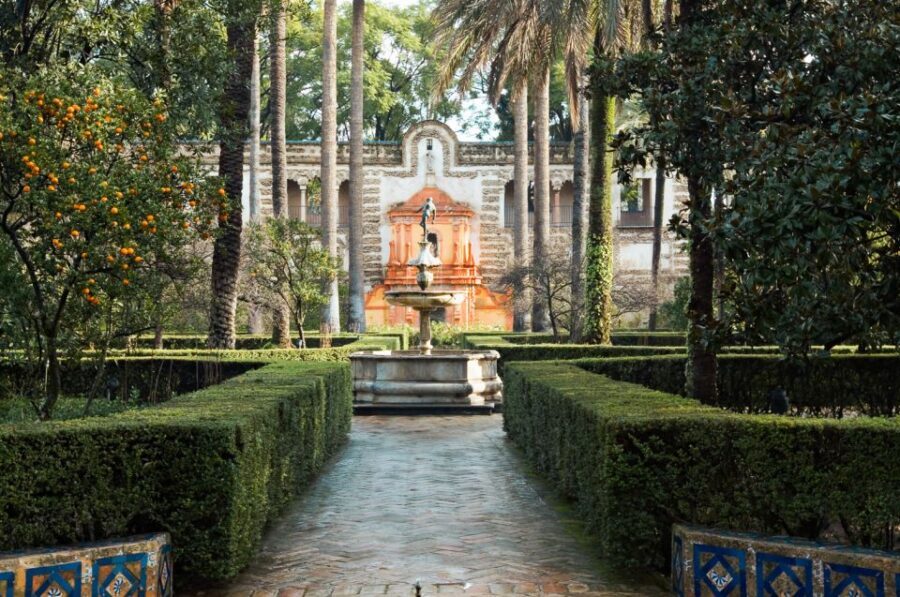 Seville: Alcazar Skip-the-Line Guided Tour with Tickets - Almohads to Fernando III: seeing power shifts in stone and space
