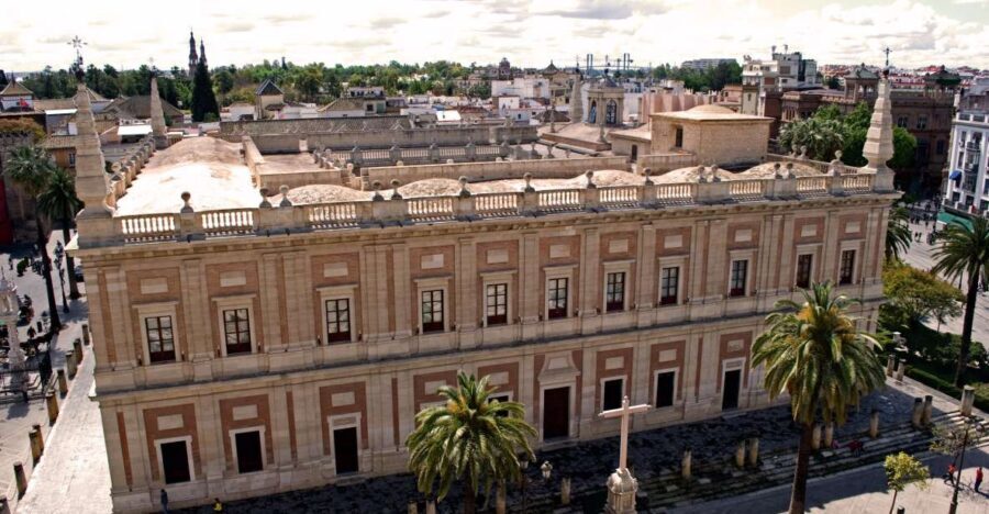 Seville: Archive of the Indies Guided Tour - The Archivo de Indias Main Front: How the Cathedral and Alcázar Set the Scene