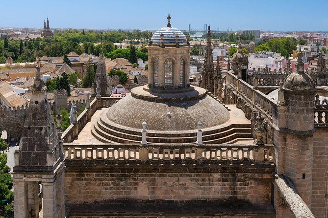 Seville Cathedral and Giralda Tower Guided Tour - Giralda Tower: former minaret to big-city views