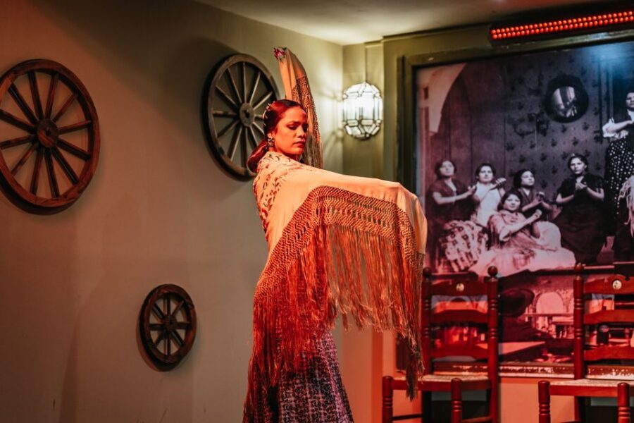 Seville: Flamenco Show with Andalusian Dinner at La Cantaora - Inside the flamenco show: singers, guitar, dancers, and audience energy