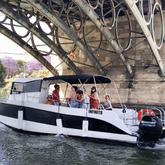 Seville: Guadalquivir River Boat Tour - Drink, Music, and That Easy Going Pace