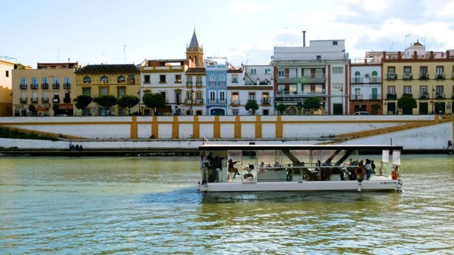 Seville: Guadalquivir & Secrets of Triana Small Group Tour - Crossing Puente de Isabel II: Where the River Story Turns into a Neighborhood Story