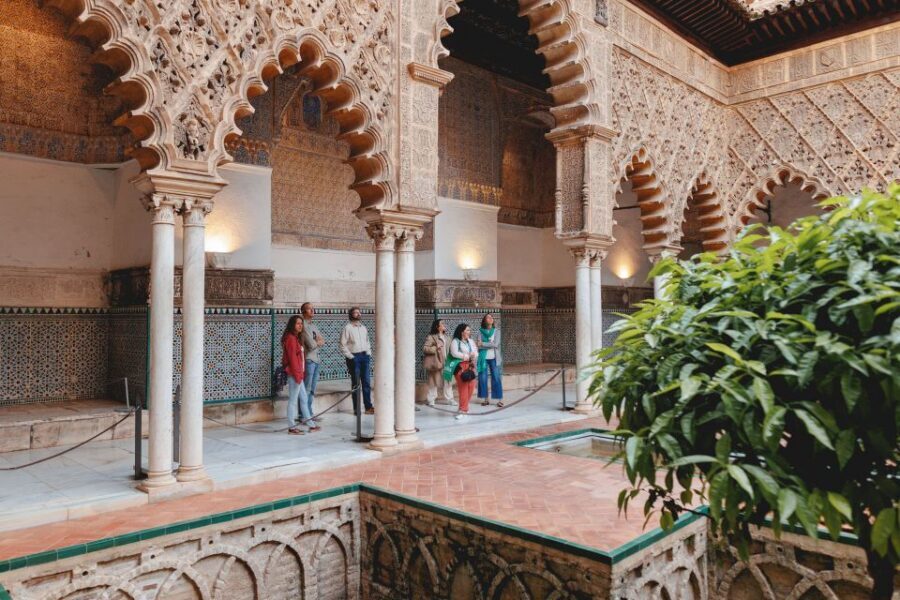 Seville: Guided Walking Tour with Alcazar & Cathedral Access - Giralda tower views: optional climb and the time cost