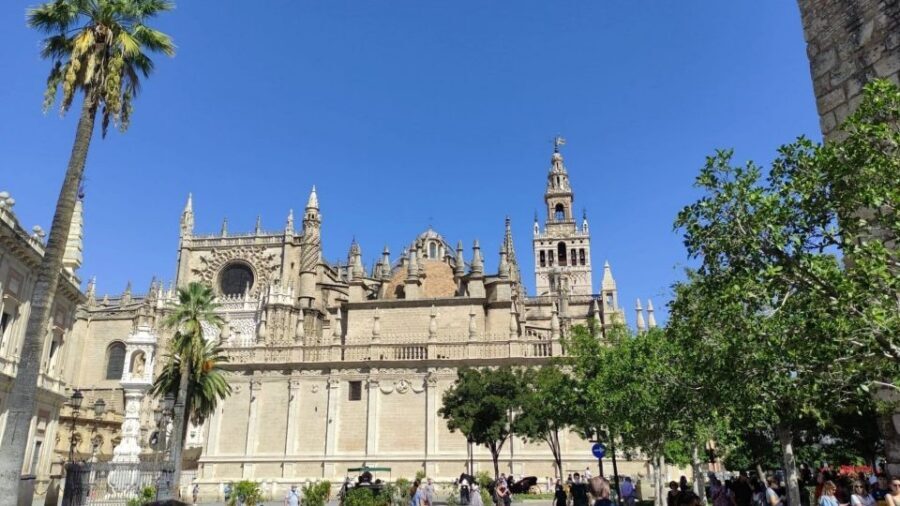 Seville: Guided Walking Tour with Optional Breakfast - Seville City Hall and the Cathedral area: power, faith, and city identity