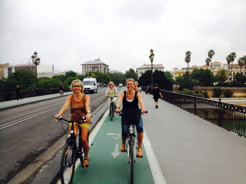 Seville: Highlights City Bike Tour - Triana tiles, pottery, and flamenco culture stop