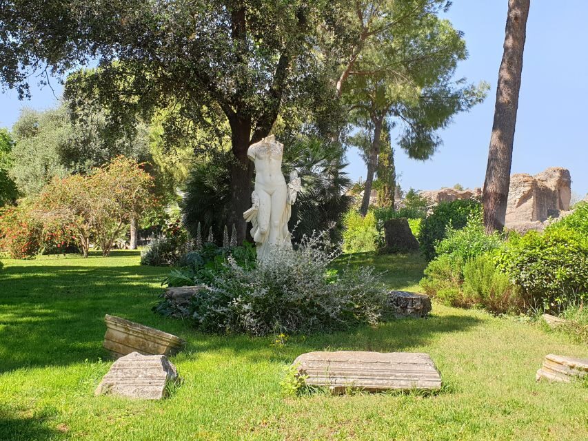 Seville: Italica Roman Ruins City Tour - Walking the main ruins: mosaics and everyday Roman life