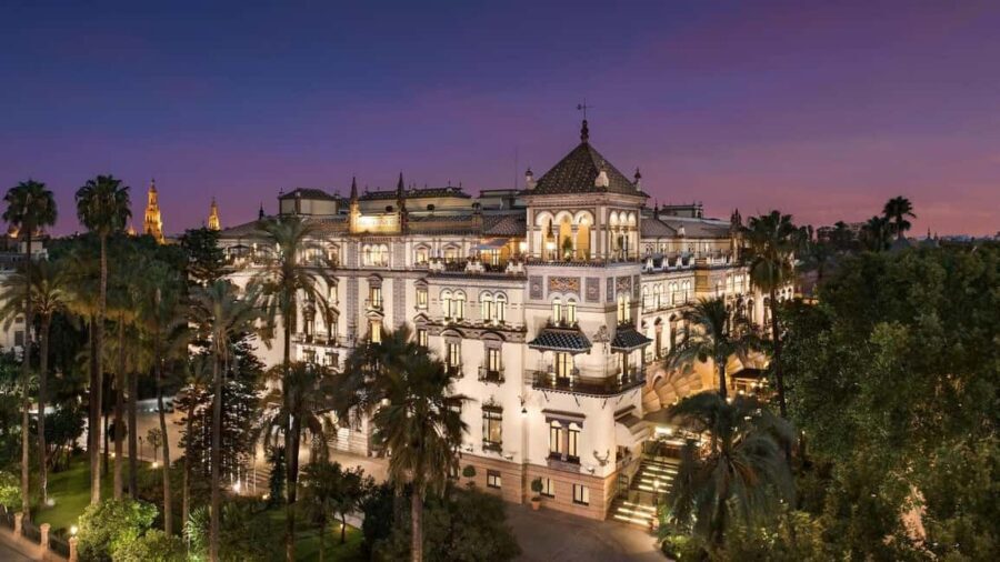 Seville Night Tour A Must See - Real Alcázar at night: Puerta del León and the towers you can picture
