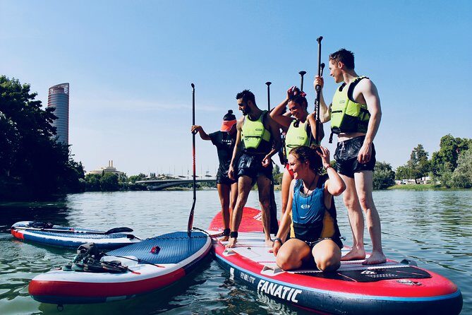 Seville: Paddle Surf on an XXL Board - Meeting at C. Betis 19 and getting suited up