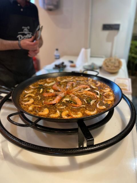 Seville: Paella and Sangria Experience - Paella and Sangria in Seville: A night that tastes like Andalusia