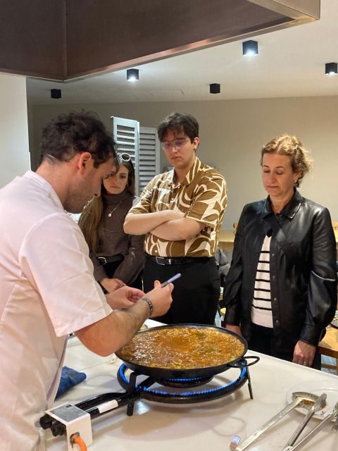Seville: Paella and Sangria Experience - The dinner setting: patio dining with city views