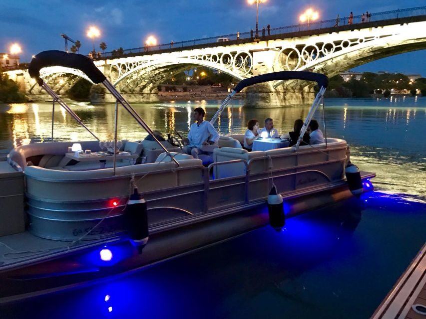 Seville: Private Boat Tour with Paella Lunch and Drinks - From Triana, the Guadalquivir feels like a different city