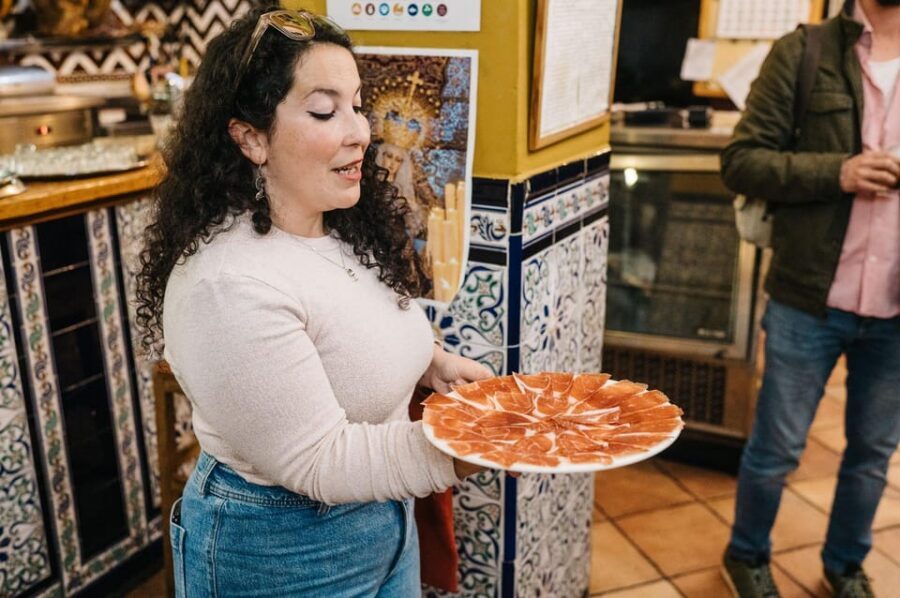 Seville: Private Tapas & History Tour in Triana Neighborhood - Triana, the neighborhood that feeds Seville from across the river