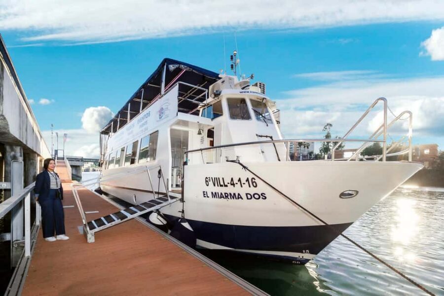 Seville: Restaurant boat ride on the Guadalquivir River with lunch/dinner - Entering the boat at Muelle Nueva York (and why that matters)