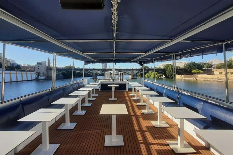 Seville: Restaurant boat ride on the Guadalquivir River with lunch/dinner - El Miarma Dos: comfort-first design on the Guadalquivir