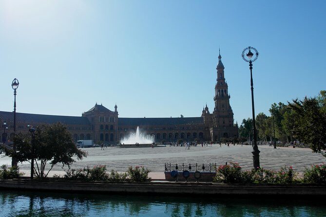 Seville tour with private car - Torre del Oro and Real Maestranza: river history and bullfighting culture