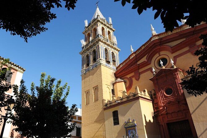 Seville Triana Quarter and River Small-Group Walking Tour - The riverfront monuments and the 1800s iron bridge