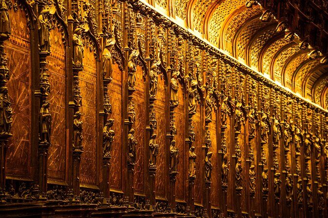 Skip the Line Seville Alcázar, Cathedral & Giralda Guided Tour - Torre Giralda: ramps, views, and the minaret-to-bell story