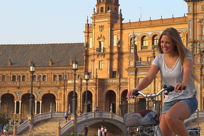 Sunset Guided Bike Tour in Seville - Baroque Buildings and the Tobacco Factory That Became a University