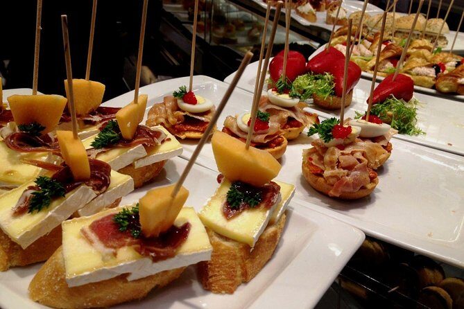 Tapas and Wine Tasting Tour in Seville Small Groups and Jewish Quarter - Plaza Nueva and Avenida de la Constitución: City Hall, Pedestrian Life, and Giralda Direction