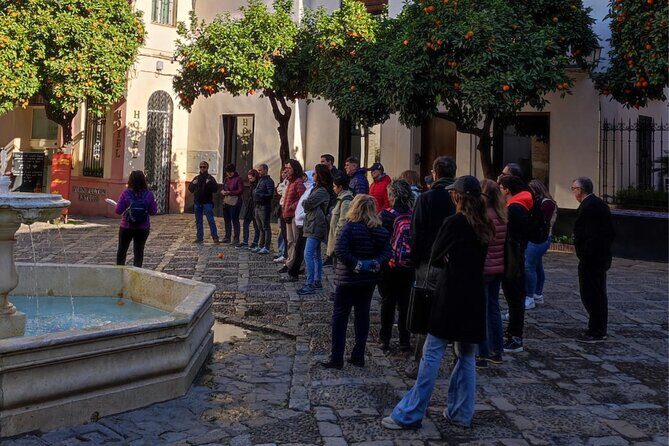 The Seville of the 3 Cultures - Triana and the Torre del Oro: crossing from Arenal to the river