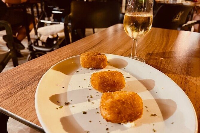 The Ultimate Seville Wine Tour with Food - Calle San José (Stop 2): tapas energy on a historic street