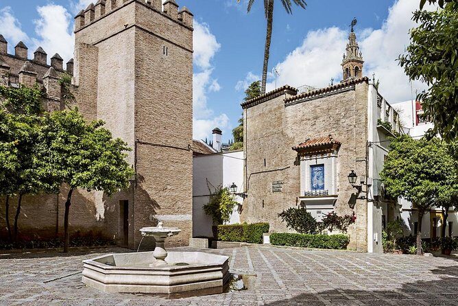 Tour Seville Complete and Jewish Quarter Santa Cruz - Towers, arches, and the Arenal side of Seville
