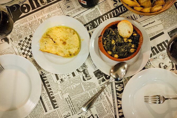 Triana Gourmet Tapas Tour in Seville - What you eat and drink: shared tapas, included beverages, and dessert