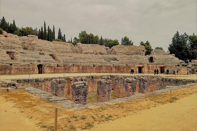 Visit to Italica Roman Ruins Tour tickets included - Stop 2: Anfiteatro de Italica and the big Roman-culture payoff